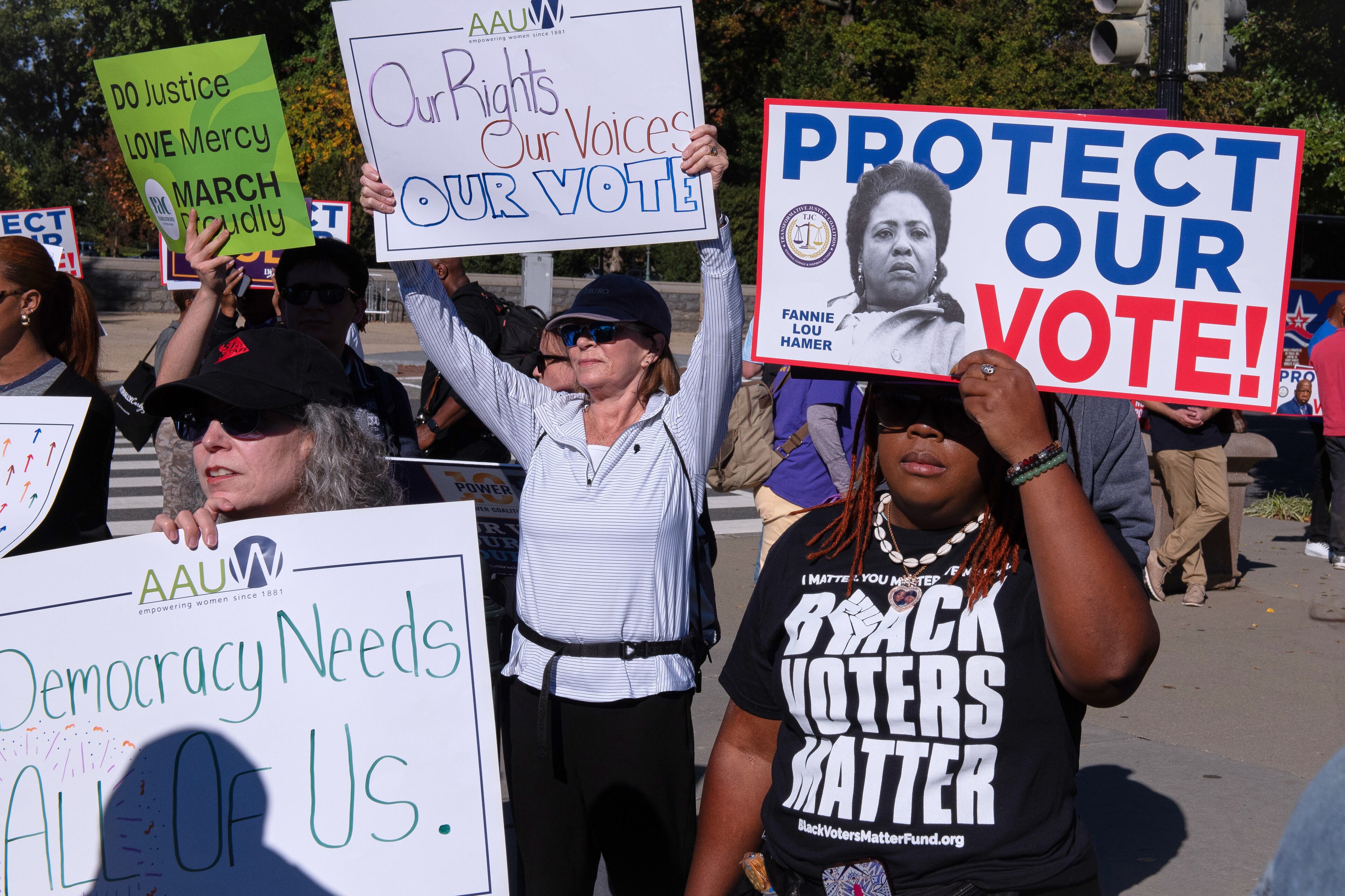 Voting rights activists gathered outside the U.S. Supreme Court in Washington on Wednesday.
