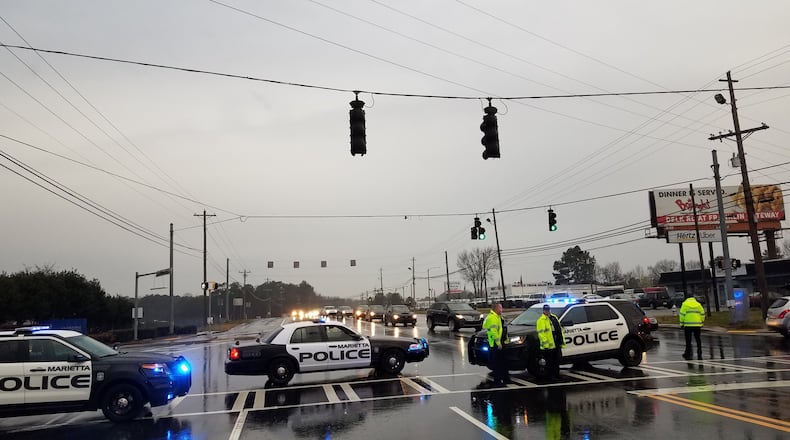 Marietta police shut down Cobb Parkway in both directions for a time Tuesday morning to investigate a pedestrian accident.