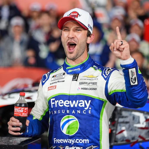 Daniel Suarez celebrates in Victory Lane after winning a NASCAR Cup Series auto race, Sunday, May 24, 2026, in Charlotte, N.C. (AP Photo/Matt Kelley)