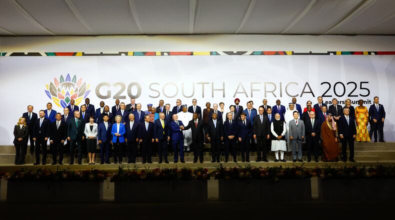 Leaders and delegates pose for a group photo, on the opening day of the G20 Leaders' Summit, in Johannesburg, South Africa, Saturday, Nov. 22, 2025. (Thomas Mukoya/Pool Photo via AP)