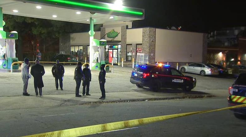 Atlanta police investigated a deadly shooting Friday morning at a BP station at the corner of Lee and Oak streets.