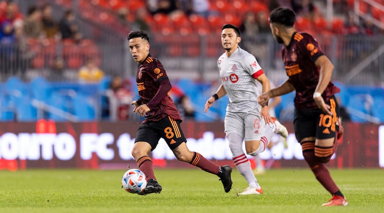 Atlanta United midfielder Ezequiel Barco (8) executed a pass during the match against Toronto FC Saturday, Oct. 16, 2021, at BMO Training Ground in Toronto, Ontario. (Jacob Gonzalez/Atlanta United)