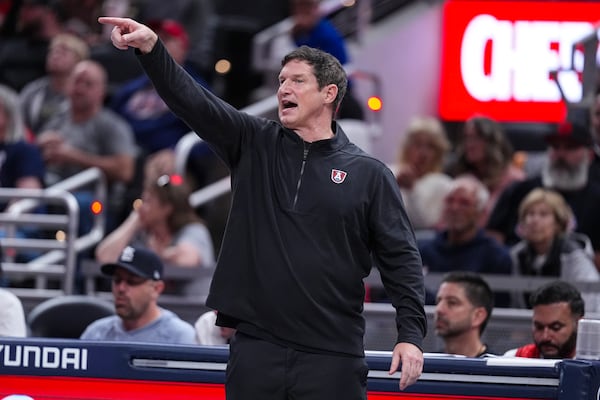 FILE - Atlanta Dream head coach Karl Smesko gestures in the second half of a WNBA basketball game against the Indiana Fever in Indianapolis, May 20, 2025. (AP Photo/Michael Conroy, file)