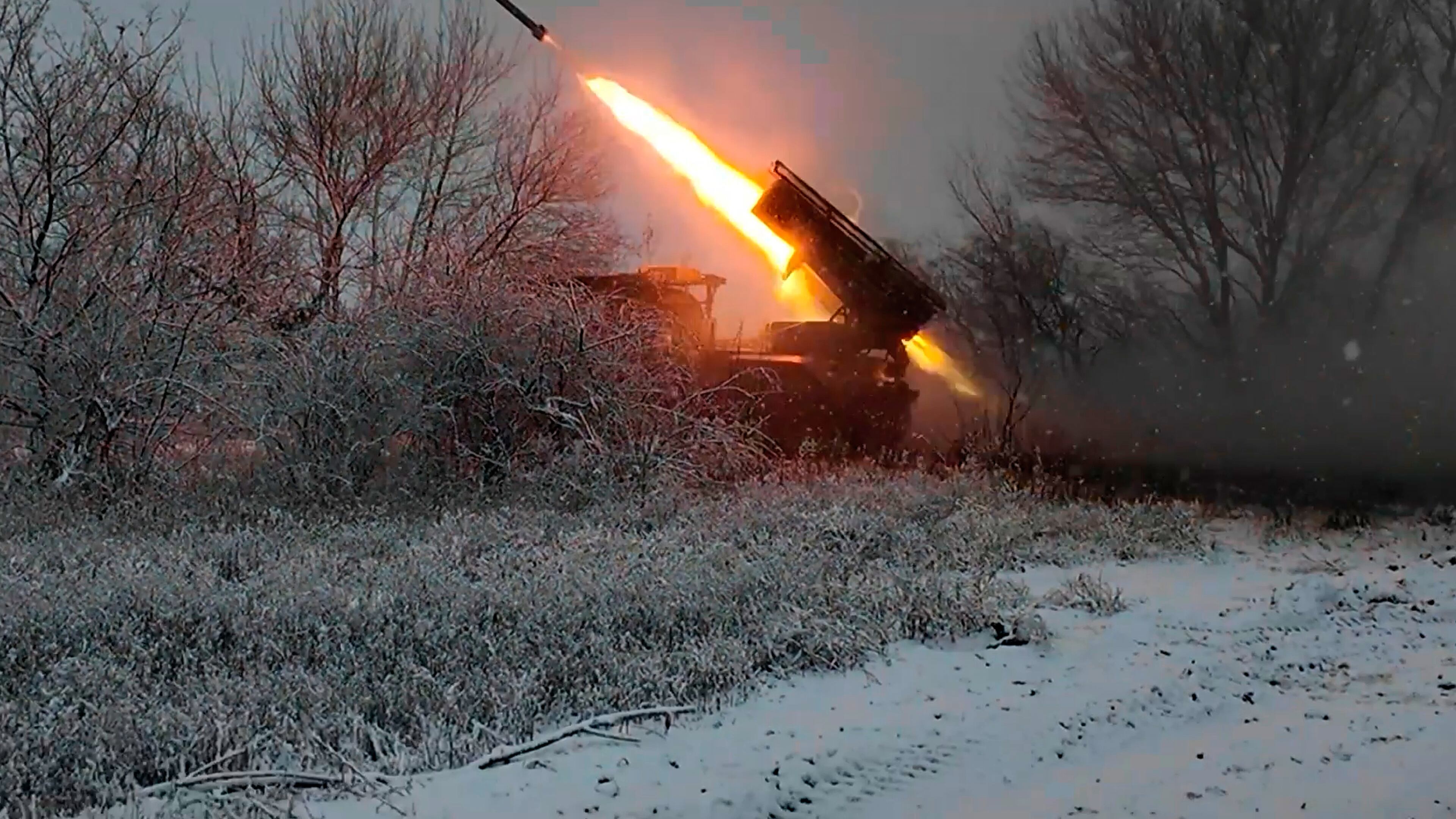 In this image, made from video provided by Russian Defense Ministry Press Service on Tuesday, Dec. 16, 2025, a Russian "Grad" self-propelled multiple rocket launcher fires towards Ukrainian positions on an undisclosed location in Ukraine. (Russian Defense Ministry Press Service via AP)