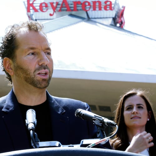 FILE- Michael Rapino, President and CEO of Live Nation Entertainment, speaks during a news conference in Seattle on June 7, 2017. (AP Photo/Ted S. Warren, File)