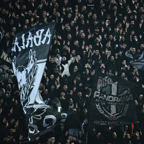 PAOK's fans wave giant flags of their team during the Europa League soccer match between PAOK and Real Betis in Thessaloniki, Greece, Thursday, Jan. 22, 2026. (AP Photo/Giannis Papanikos)