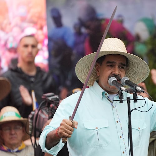 President Nicolas Maduro addresses supporters during a rally marking the anniversary of the Battle of Santa Ines, which took place during Venezuela's 19th-century Federal War, in Caracas, Venezuela, Wednesday, Dec. 10, 2025. (AP Photo/Ariana Cubillos)