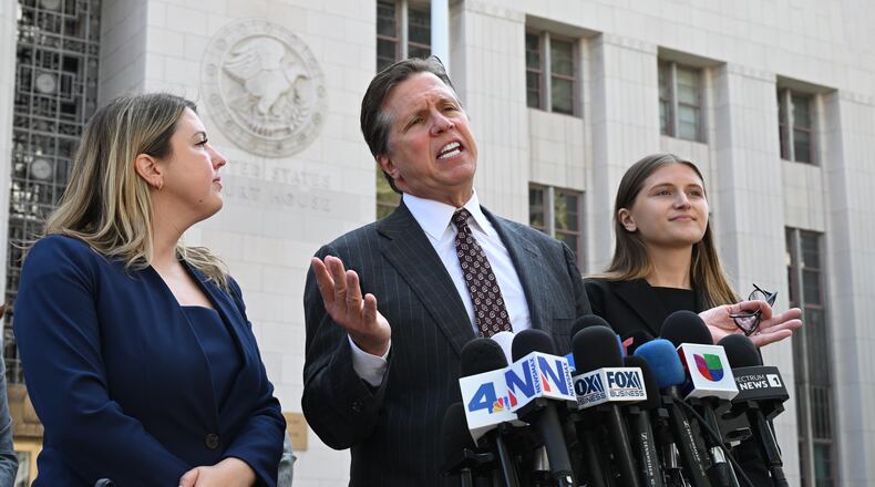 FILE - Attorney Mark Lanier speaks during a news conference after the verdict in a landmark trial over whether social media platforms deliberately addict and harm children at Los Angeles Superior Court, March 25, 2026, in Los Angeles. (AP Photo/William Liang, File)