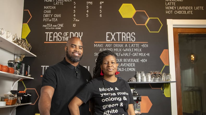 04/30/2020 - Atlanta, Georgia - Just Add Honey Tea Company owners Brandi and Jermail Shelton stand for a photo at their shop, located at 684 John Wesley Dobbs Avenue, in Atlanta’s Old Fourth Ward neighborhood, Thursday, April 30, 2020. They have switched their focus to online orders during the COVID-19 pandemic. (ALYSSA POINTER / ALYSSA.POINTER@AJC.COM)