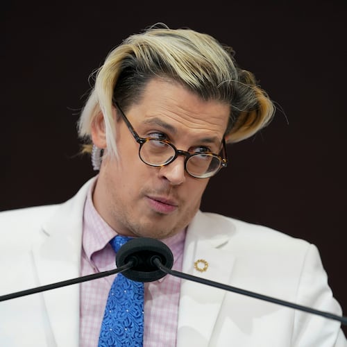 FILE - Activist Milo Yiannopoulos speaks during a rally outside of the Baltimore hotel where the United States Conference of Catholic Bishops are holding its Fall General Assembly meeting in Baltimore, Nov. 16, 2021. (AP Photo/Julio Cortez, File)