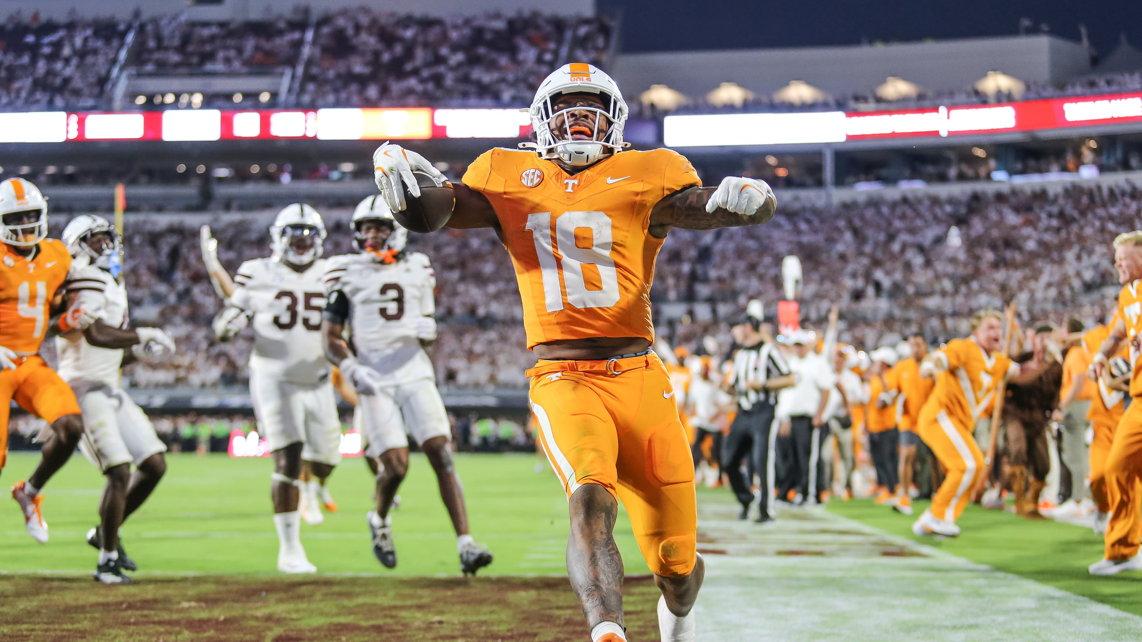 Tennessee running back DeSean Bishop (18) scores the go-ahead touchdown against Mississippi State during the overtime of an NCAA college football game in Starkville, Miss., Saturday, Sept. 27, 2025. (AP Photo/James Pugh)