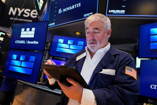Trader Edward McCarthy works on the floor of the New York Stock Exchange, Tuesday, June 3, 2025. (AP Photo/Richard Drew)