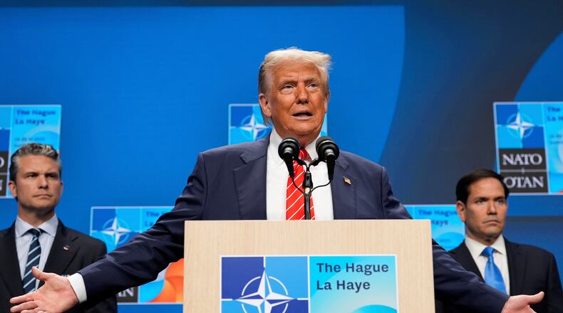 FILE - President Donald Trump speaks during a media conference at the end of the NATO summit as Secretary of State Marco Rubio, right, and Defense Secretary Pete Hegseth listen in The Hague, Netherlands, June 25, 2025. (AP Photo/Alex Brandon, File)