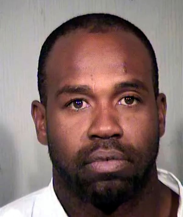 FILE - This undated file booking photo provided by the Maricopa County Sheriff's Office shows Cleophus Cooksey Jr. (Maricopa County Sheriff's Office via AP, File)