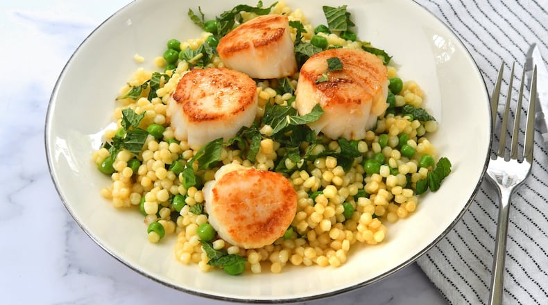 Seared Scallops with Minty Peas and Couscous.
Chris Hunt for The Atlanta Journal-Constitution