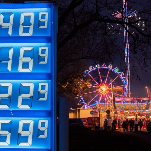 Gas prices are displayed near a ferris wheel in Frankfurt, Germany, Thursday, April 2, 2026. (AP Photo/Michael Probst)