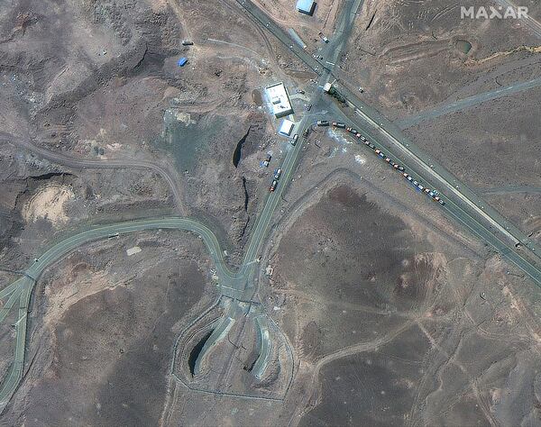 This satellite image provided by Maxar Technologies shows vehicles at the Fordo enrichment facility in Iran on June 19, 2025. (Maxar Technologies via AP)