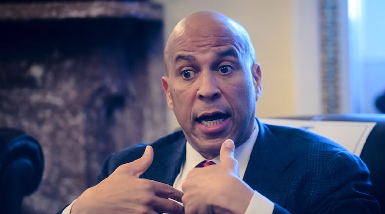 Sen. Cory Booker, D-N.J., speaks during a press briefing on the Iran war powers resolution at the Capitol, Monday, March 9, 2026, in Washington. (AP Photo/Rod Lamkey, Jr.)