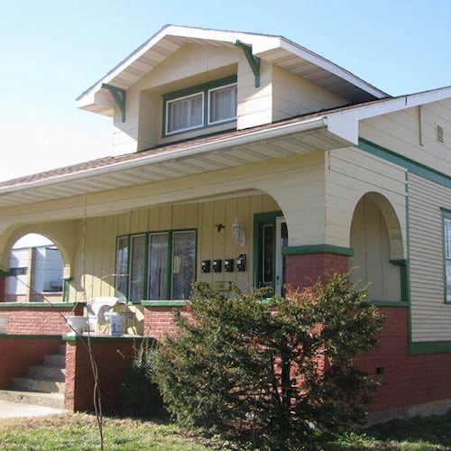 This photo provided by Grady Adams shows the house at 113 McCann Street in Benton, Illinois, where a then-unknown George Harrison stayed while visiting his sister in September 1963, months before the Beatles debuted in the U.S., which is now for sale and some Beatles fans fear it will be razed. (Grady Adams via AP)