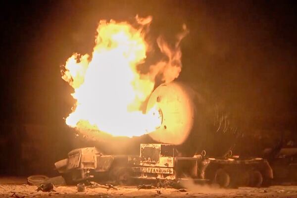 In this photo taken from video released by Al Masirah TV channel shows a burning oil tanker after U.S. airstrikes targeted the Ras Isa oil port held by Yemen's Houthi rebels in Hodeida, Yemen, Friday, April 18, 2025.( Al Masirah TV via AP)
