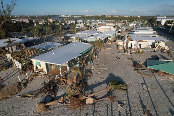 FILE - Damage from Hurricane Milton is seen at a mobile home community on Manasota Key, in Englewood, Fla., Sunday, Oct. 13, 2024. (AP Photo/Rebecca Blackwell, File)