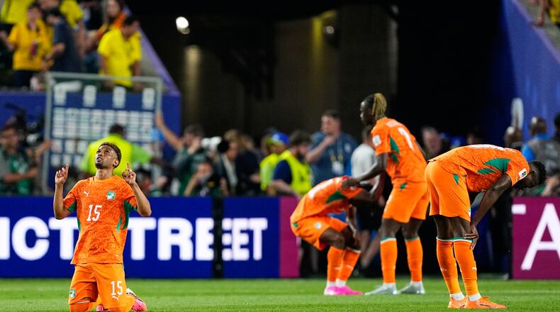 Ivory Coast's Amad Diallo (15) reacts with teammates following their World Cup Group E soccer match win over Ecuador in Philadelphia, Sunday, June 14, 2026. (AP Photo/Petr David Josek)