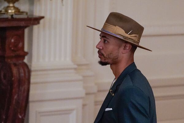 FILE - Los Angeles Dodgers right fielder Mookie Betts arrives at an event to honor the 2020 World Series champion Dodgers baseball team at the White House, July 2, 2021, in Washington. (AP Photo/Julio Cortez, File)