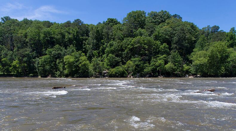 Four people were rescued Monday, but officials continue to search for a person still missing on the Chattahoochee River.