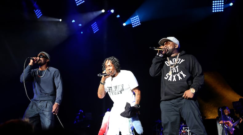 The highlight of One Musicfest was the reunion of Outkast, shown with Goodie Mob's Big Gipp (center). (Akili-Casundria Ramsess/Special to the AJC)