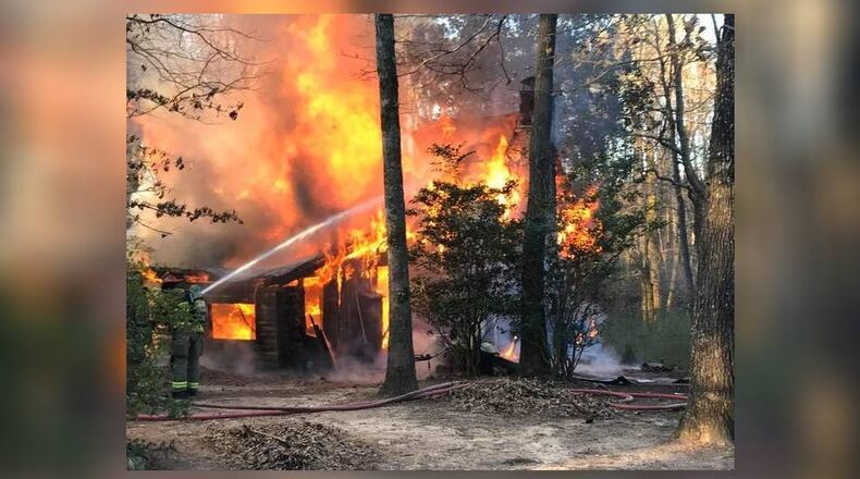 One woman was killed Saturday morning when a wood cabin caught fire in northeast Georgia, authorities said.