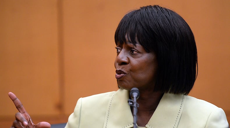 Former APS Venetian Hills principal Clarietta Davis testifies Wednesday. Davis is one of the former co-defendants that took a plea deal in January 2014. KENT D. JOHNSON / KDJOHNSON@AJC.COM