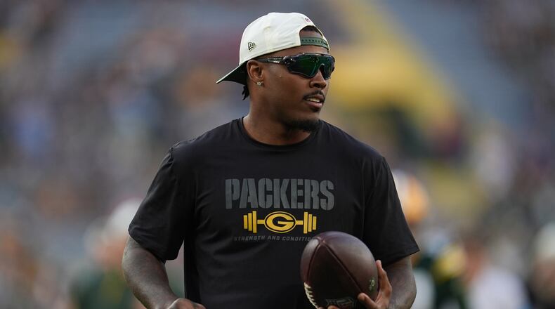 FILE - Green Bay Packers running back Josh Jacobs stands on the field before a NFL preseason football game against the Arizona Cardinals, Aug. 28, 2026, in Green Bay, Wis. (AP Photo/Abbie Parr, File)
