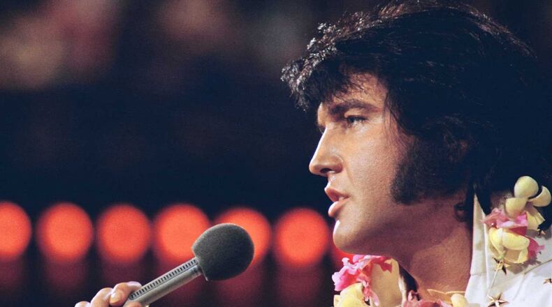 Elvis Presley performing onstage. CONTRIBUTED BY: Elvis.com