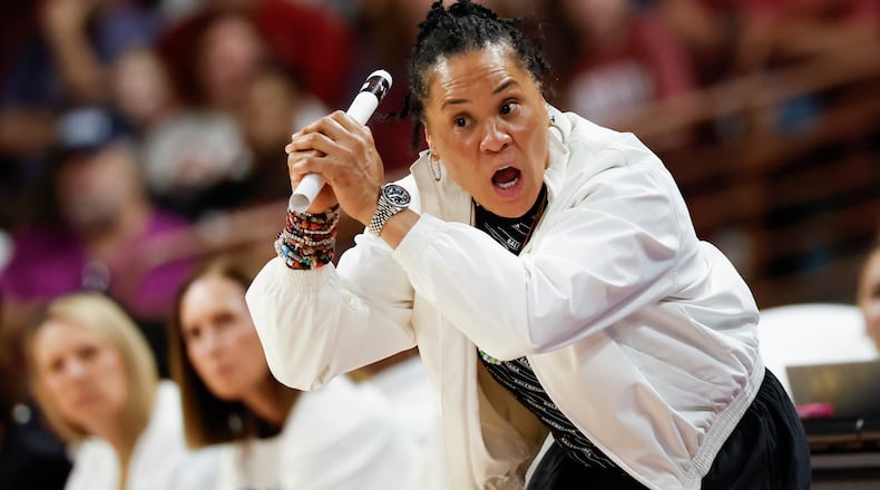 South Carolina head coach Dawn Staley directs her team against Southern California during the first half in the second round of the NCAA college basketball tournament, Monday, March 23, 2026, in Columbia, S.C. (AP Photo/Nell Redmond)