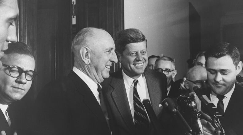 Pres. John F. Kennedy (center right) talks with Sen. Richard B. Russell (center left). A Senate office  building was named for Russell, a Democratic Senator from Georgia, after he died in 1971.  That building, the Russell Senate Office Building, may be renamed in honor of Sen. John McCain. McCain died Saturday, Aug. 25, 2018.