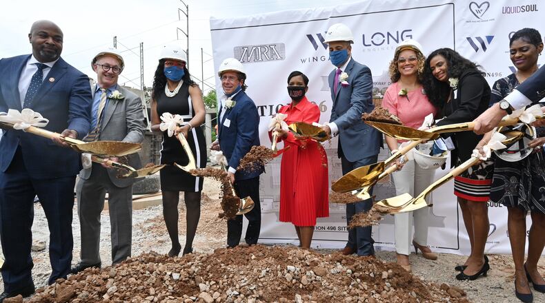Wingate Companies CEO Mark Schuster (center left) and Atlanta Mayor Keisha Lance Bottoms (center right) participated in Station 496's groundbreaking ceremony in the Old Fourth Ward neighborhood on Thursday, April 29, 2021. (Hyosub Shin / Hyosub.Shin@ajc.com)