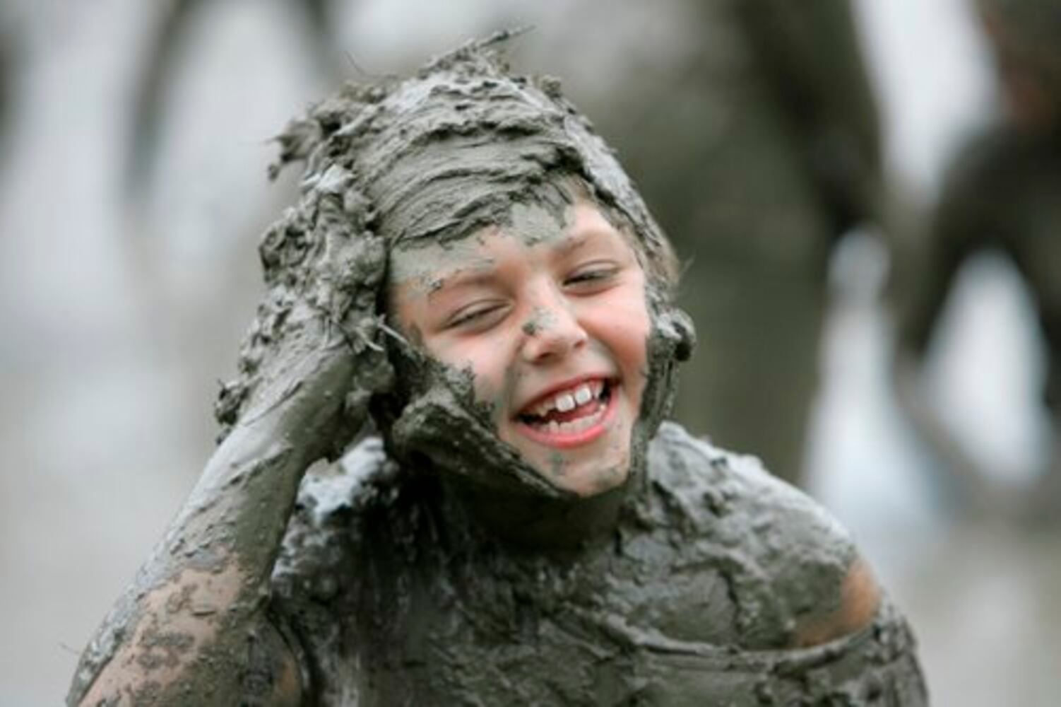 Dream day: Kids frolick in muddy goo