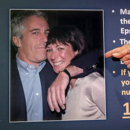 FILE - Audrey Strauss, acting U.S. attorney for the Southern District of New York, points to a photo of Jeffrey Epstein and Ghislaine Maxwell during a news conference in New York on July 2, 2020. (AP Photo/John Minchillo, File)