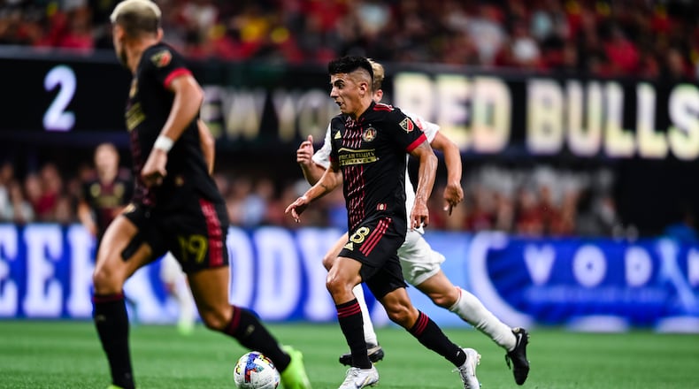 Atlanta United's Thiago Almada dribbles the ball during the match against New York Red Bulls on Wednesday night at Mercedes-Benz Stadium. (Photo by Mitchell Martin/Atlanta United)