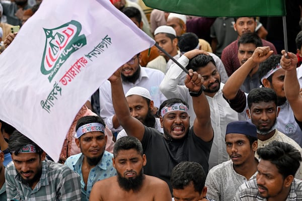 Supporters of Bangladesh's largest Islamist party Jamaat-e-Islami attend a rally in a show of strength ahead of elections expected next year, in Dhaka, Bangladesh, Saturday, July 19, 2025. (AP Photo/Mahmud Hossain Opu)