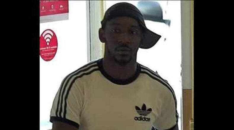 Police say this man followed his victim, broke into a car and stole a large amount of money. Authorities are looking for him.