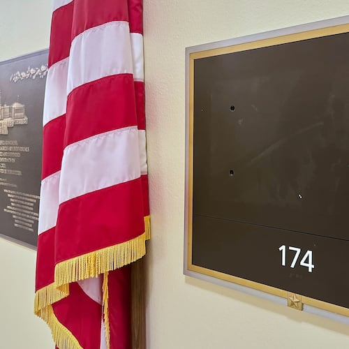 FILE - The name plate of Rep. Eric Swalwell, D-Calif., has been removed from his former office, April 15, 2026, on Capitol Hill in Washington. (AP Photo/Nathan Ellgren, File)