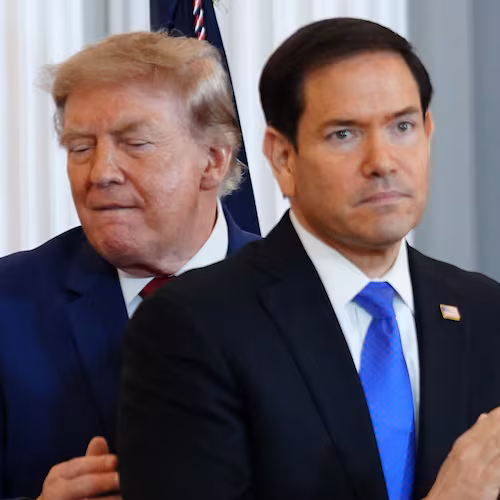 President Donald Trump walks past Secretary of State Marco Rubio as he arrives for a roundtable on the American mining industry, Friday, Aug. 7, 2026, at the State Department in Washington. (AP Photo/Julia Demaree Nikhinson)