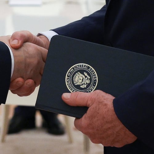 FILE - Russian President Vladimir Putin and U.S. President Donald Trump's special envoy Steve Witkoff shakes hands during their meeting at the Kremlin, in Moscow, on Aug. 6, 2025. (Gavriil Grigorov, Sputnik, Kremlin Pool Photo via AP, File)