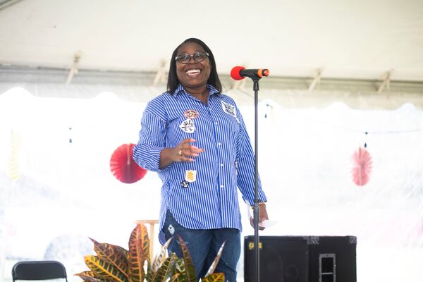 Stephanie Flowers, a 40-year community resident and community advocate who participated in the community-led planning of Pittsburgh Yards, speaks at the initial community celebration of Pittsburgh Yards in September 2021. (Courtesy of Pittsburgh Yards)
