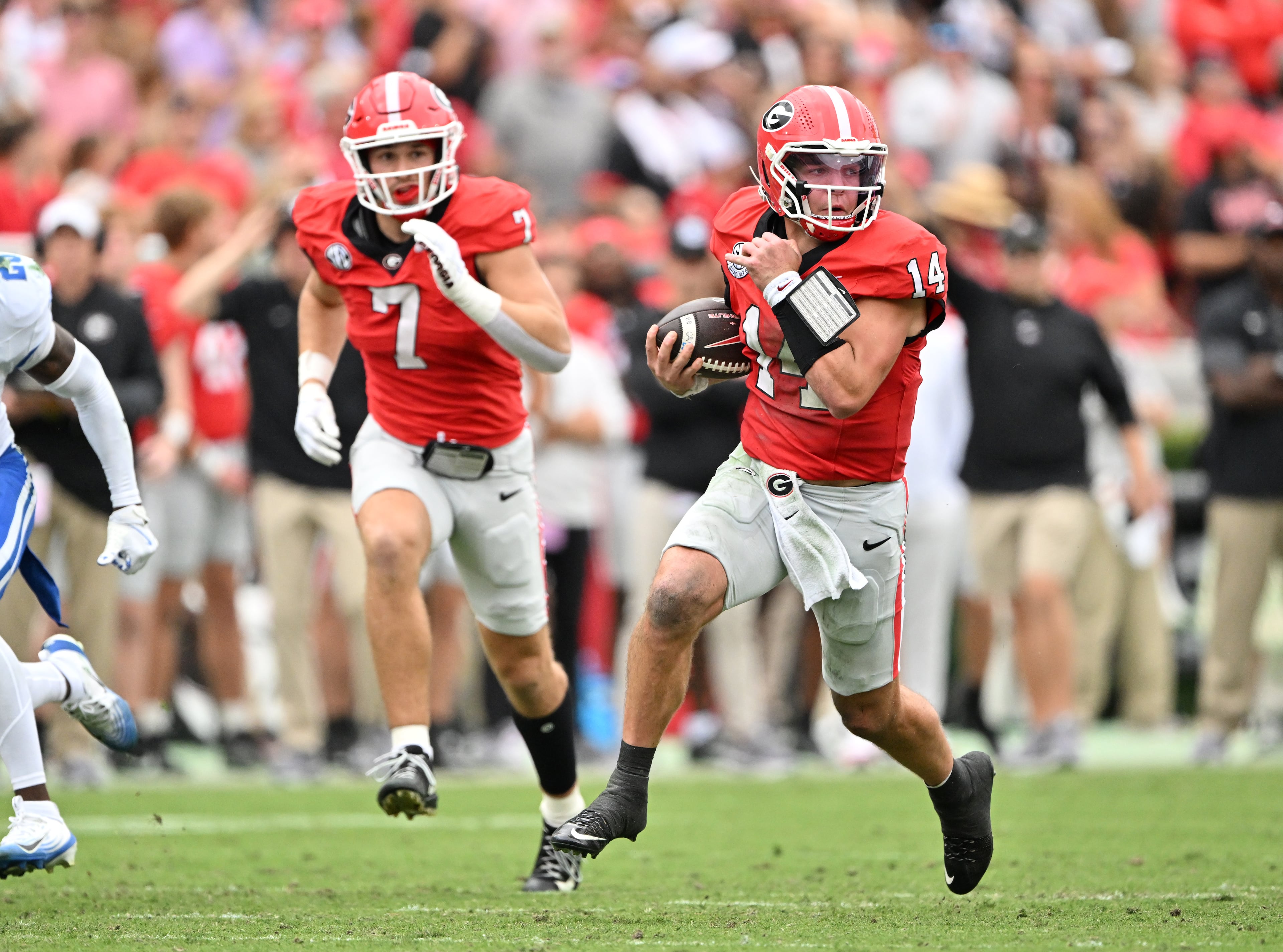 Georgia quarterback Gunner Stockton (14) runs the ball during the first half in a NCAA college football game at Sanford Stadium, Saturday, October 4, 2025, in Athens. (Hyosub Shin / AJC)