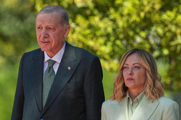Turkey's President Recep Tayyip Erdogan, right, meets with Italian Prime Minister Giorgia Meloni at villa Doria Pamphilj, in Rome, Tuesday, April 29, 2025. (AP Photo/Francisco Seco)