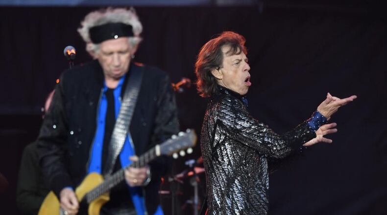 MIck Jagger, right, Keith Richards and the Rolling Stones will be crossing the United States beginning in April for a 13-date stadium tour.