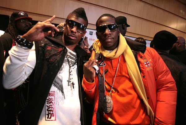 Grand Hustle artists Yung LA (left) and Young Dro pose on the black carpet before the start of the Dirty Awards. (Jessica McGowan/AJC)