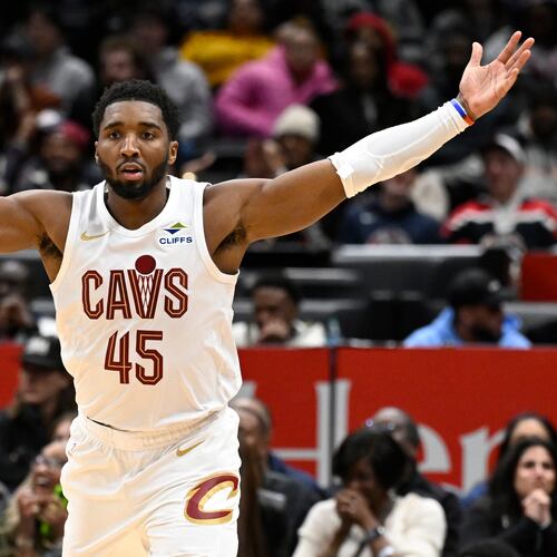 Cleveland Cavaliers guard Donovan Mitchell celebrates after his go-ahead basket late in the second half of an NBA basketball game against the Washington Wizards, Friday, Dec. 12, 2025, in Washington. (AP Photo/John McDonnell)